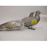 A pair of silver plated table pheasants, male and female, 6"h, 15" l