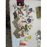 Military related items to include cloth badges, buttons, other badges to include Transport and