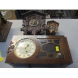 Two cuckoo clocks, together with a 1930s oak wall hanging clock