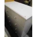 A modern white painted chest of two short and three long drawers, 37 1/2"h x 34"w