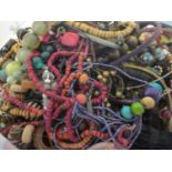 A selection of costume jewellery to include beaded necklaces, bracelets and other items