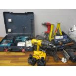 A quantity of DIY tools to include an SDS drill, a car jack, a Dewalt and spanners
