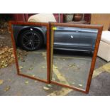 A pair of modern walnut framed mirrors, 33" h x 22 1/2"w