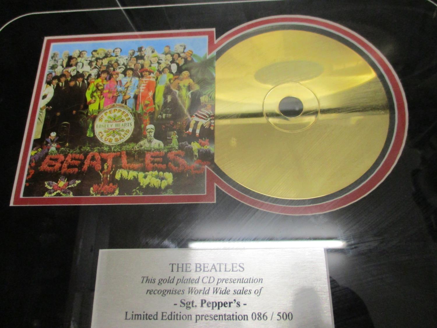 Three framed gold plated records to commemorate the World Wide Sales of Sgt Pepper by The Beatles - Image 4 of 4