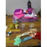 A mixed lot to include London Olympics ambassador helpers uniform, Barbie mermaid dolls, Babycham