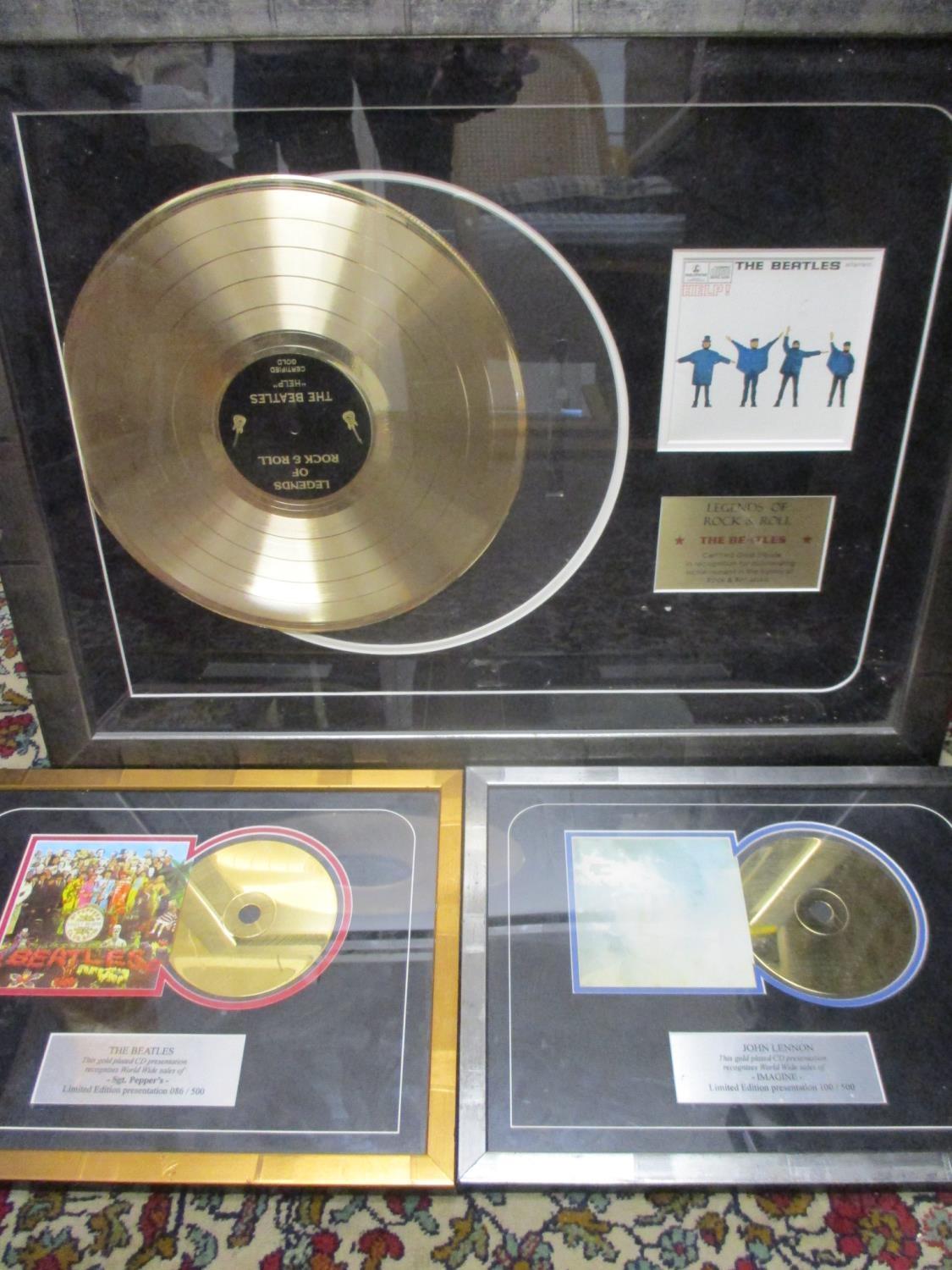 Three framed gold plated records to commemorate the World Wide Sales of Sgt Pepper by The Beatles