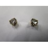 A pair of diamond earrings, approximately 0.4ct each in a 9ct gold setting