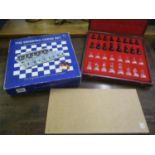 Two boxed chess sets to include The Drinking Chess Set