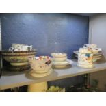 A quantity of mainly early 19th century English earthenware and porcelain tableware, together with a