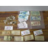 Coins and bank notes to include American 1930s coins, a £1, Azerbaijan and other notes