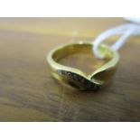 A 9ct gold and diamond wedding ring, 4.2g