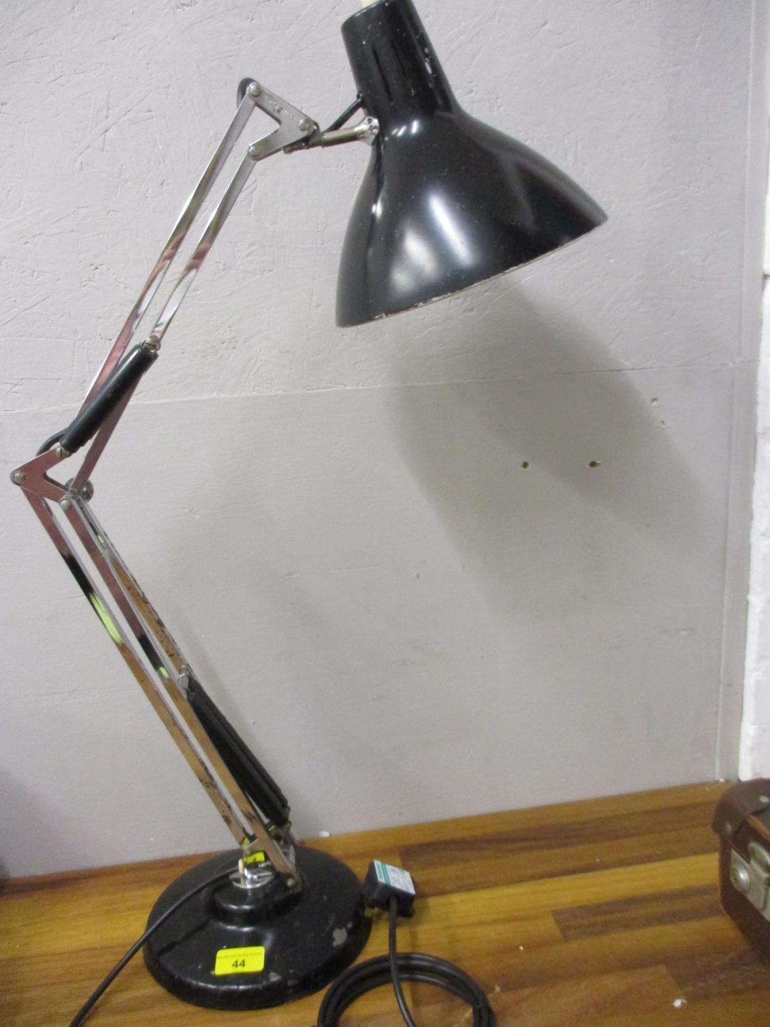 A Luxo black painted and chrome anglepoise lamp, re-wired and pat tested