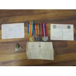 WWI and WWII medals to include Victory British War and Defence, and a War badge award certificate