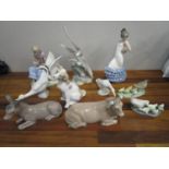 Ten Nao porcelain figures and model animals to include a donkey, a cow, a dog and others