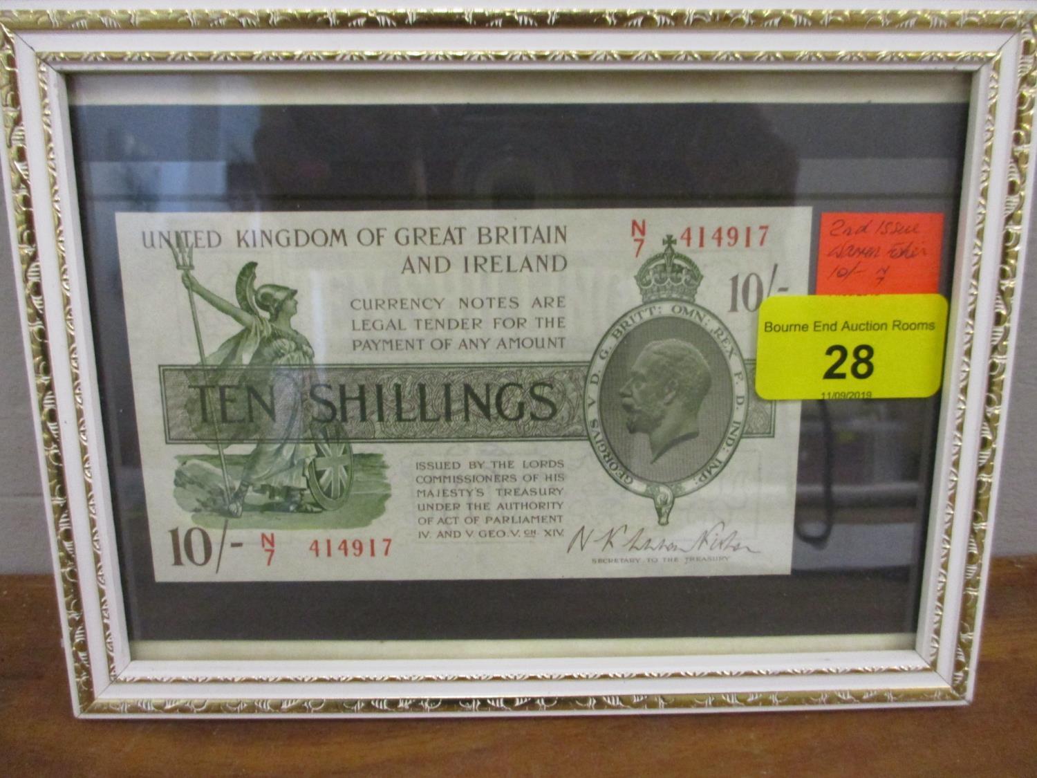 A mint condition 2nd issue Warren Fisher Ten-Shilling note in a display frame