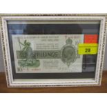 A mint condition 2nd issue Warren Fisher Ten-Shilling note in a display frame