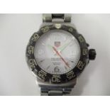 A gents Tag Heuer Formula One, stainless steel cased wristwatch with integral bracelet, three