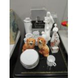 A mixed lot to include Royal Doulton white glazed china figures, a commemorative metal bell, a