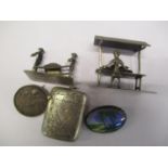 A mixed lot to include a silver vesta case, Chinese white metal and two brooches