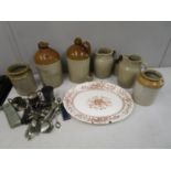 Stoneware jars and flagons, silver plated flatware and an earthenware meat plate