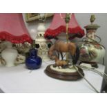 Five table lamps to include a pottery example in the oriental taste