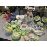 A mixed lot to include Shelley china, Victorian cranberry glass, two Radnor figures and other items