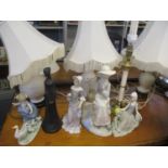 Four mixed table lamps to include a white glazed lamp having floral and pierced decoration, together