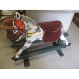 A vintage painted child's rocking horse