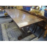 An early 20th century oak refectory table with bulbous turned columns, on splayed block feet, 29 1/