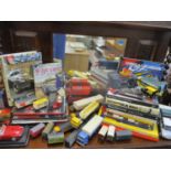 A mixed lot to include 00 gauge, loose toy cars and mixed Formula 1 related books