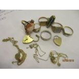 Mixed gold rings, heart lockets and chains, all 9ct gold, total weight 32g, together with a green