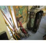 A set of Wilson golf clubs, two golf bags and a trolley, along with a selection of vintage garden