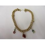 A gold link chain bracelet with safety chain and three coloured charms, 13g