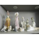 A group of Lladro, Nao and other figurines and animal models to include a Lladro figure of a girl