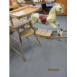 An early 20th century painted rocking horse and a metamorphic child's high chair