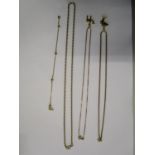 A quantity of 9 and 18ct yellow gold chain necklaces, pendants and a bracelet