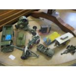 A small selection of vintage Dinky and other die cast vehicles to include army vehicles