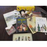 A Pelham puppet horse in original box, mixed books, a glass trinket box and a set of lead figures to