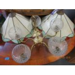 Two Tiffany style pendant ceiling lights with brass and cut glass lamp shades