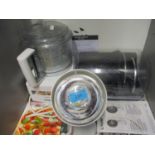 A Magimix Compact 3200 food processor, together with a Beurer infrared lamp