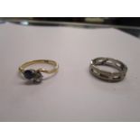 An 18ct gold old cut diamond and sapphire crossover ring, along with an 18ct white gold band