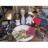 A vintage lot to include a large charger, an oil lamp, a collectors doll, a microscope, a bugle,