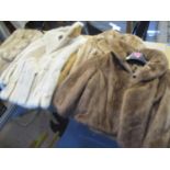 Mixed fur clothing to include a rabbit fur coat