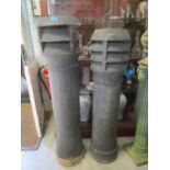 Two Victorian terracotta chimney pots, the tallest 50" h