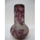 A Galle cameo, purple and opaque glass vase decorated with hanging flowers and leaves with a