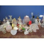 A collection of various glass scent bottles and five glass decanters to include empty perfume