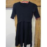 Chloe - a 'See By Chloe' virgin wool, above knee length dress in navy with internal pink trim to the