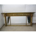 A mid 19th century gilt gesso overmantle mirror with an inverted, breakfront cornice, over turned