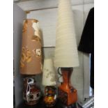 Three West German pottery lamps to include two floor lamps, each with a shade