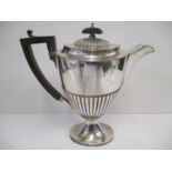 An Edwardian silver hot water jug by Richard Martin and Ebenezer Hall Sheffield 1909, of ovoid